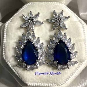 Blue and White Simulated Sapphire Star Lilly Drop Halo Earrings